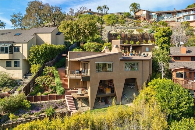 1372 Morningside Dr, Laguna Beach, CA 92651 - rear view of house featuring stairs, stucco siding, and a wooden deck