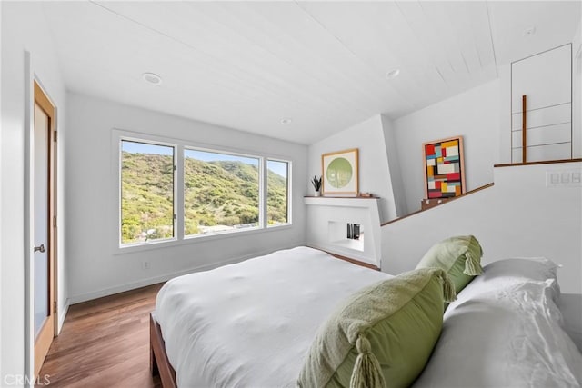 1372 Morningside Dr, Laguna Beach, CA 92651 - bedroom featuring wood finished floors and lofted ceiling