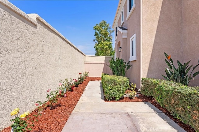 14941 Almond Grove Ct, Tustin, CA 92780 - view of yard with a patio area