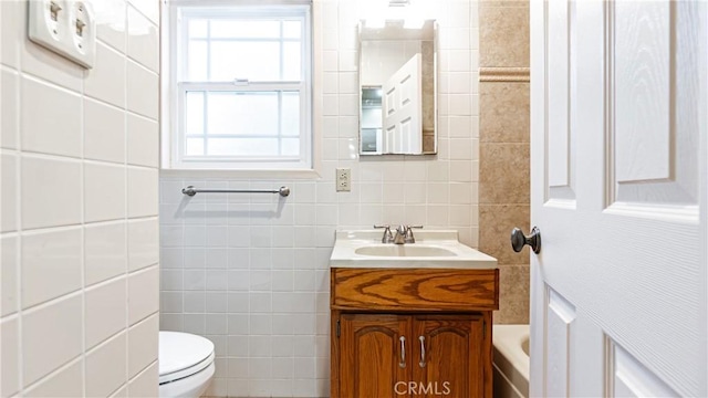 5449 E Fairbrook St, Long Beach, CA 90815 - bathroom with tile walls and vanity