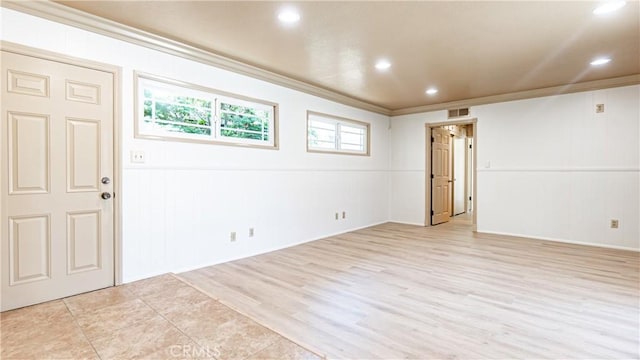 5449 E Fairbrook St, Long Beach, CA 90815 - spare room with ornamental molding, a decorative wall, light wood finished floors, and recessed lighting