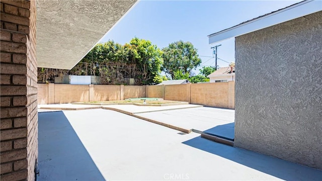 5449 E Fairbrook St, Long Beach, CA 90815 - fenced backyard with a patio area