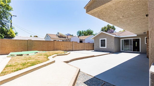 5449 E Fairbrook St, Long Beach, CA 90815 - fenced backyard with a patio area