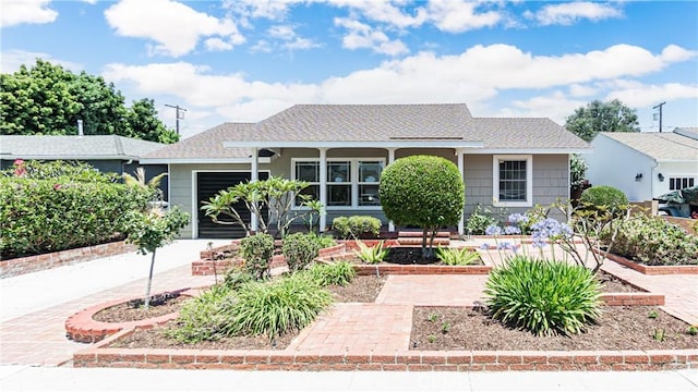 5449 E Fairbrook St, Long Beach, CA 90815 - bungalow-style house with an attached garage and a shingled roof
