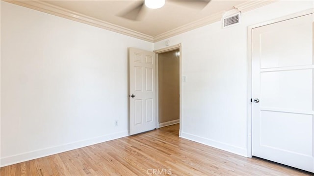 5449 E Fairbrook St, Long Beach, CA 90815 - unfurnished bedroom with ornamental molding, light wood finished floors, a ceiling fan, and a closet