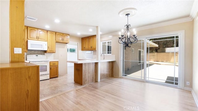 5449 E Fairbrook St, Long Beach, CA 90815 - kitchen with white appliances, a chandelier, a peninsula, crown molding, and light wood-style flooring