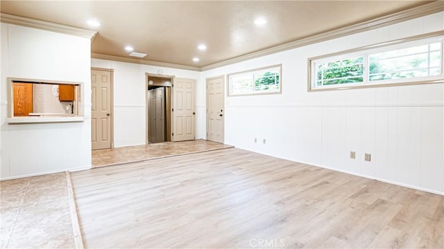 5449 E Fairbrook St, Long Beach, CA 90815 - unfurnished living room featuring ornamental molding, light wood-style flooring, and recessed lighting