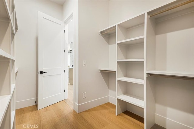 5891 Crestmoor Dr, Paradise, CA 95969 - walk in closet featuring light wood-style flooring