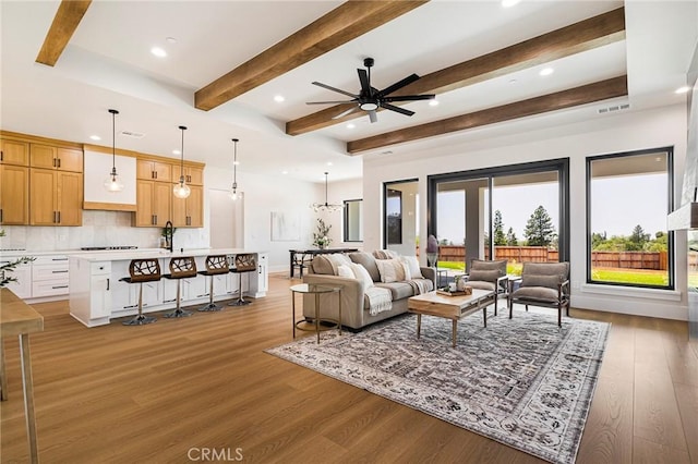 5891 Crestmoor Dr, Paradise, CA 95969 - living room with recessed lighting, light wood finished floors, beam ceiling, and ceiling fan