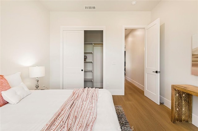 5891 Crestmoor Dr, Paradise, CA 95969 - bedroom featuring wood finished floors and a closet