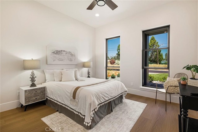 5891 Crestmoor Dr, Paradise, CA 95969 - bedroom featuring multiple windows, wood finished floors, recessed lighting, and a ceiling fan