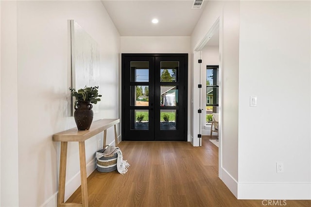 5891 Crestmoor Dr, Paradise, CA 95969 - entrance foyer with wood finished floors, french doors, and recessed lighting