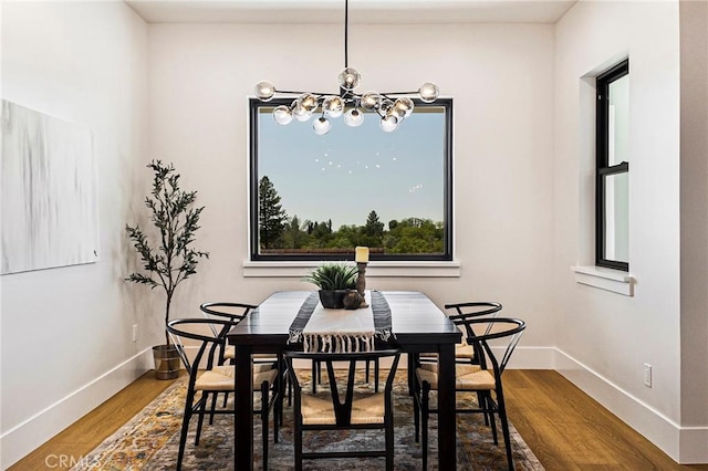 5891 Crestmoor Dr, Paradise, CA 95969 - dining space with a chandelier and wood finished floors
