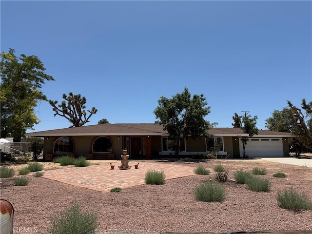 20219 Osseo Rd, Apple Valley, CA 92308 - single story home featuring driveway and an attached garage