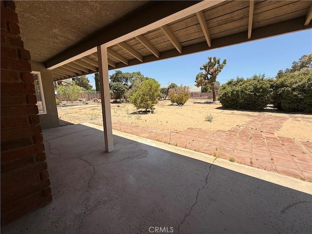 20219 Osseo Rd, Apple Valley, CA 92308 - fenced backyard featuring a patio
