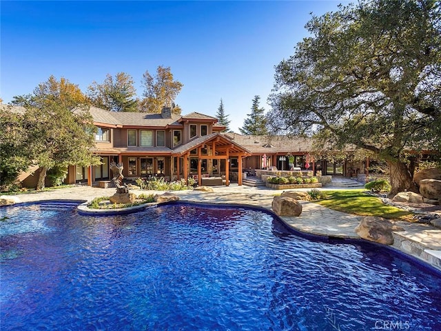 11485 Awenita Ct, Chatsworth, CA 91311 - swimming pool featuring a patio
