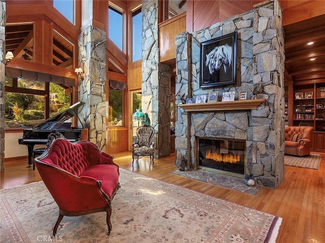 11485 Awenita Ct, Chatsworth, CA 91311 - living area featuring a stone fireplace and wood-type flooring