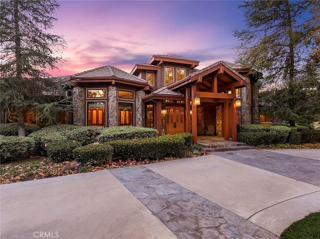 11485 Awenita Ct, Chatsworth, CA 91311 - view of front of home featuring stone siding and a tiled roof