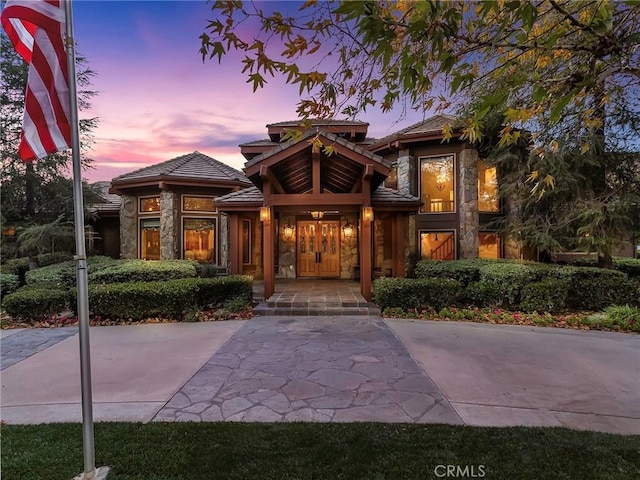 11485 Awenita Ct, Chatsworth, CA 91311 - exterior entry at dusk with stone siding