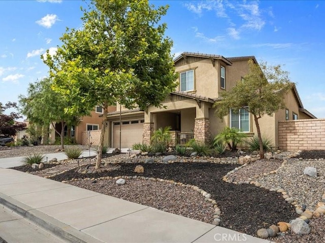 35403 Laurel Tree Ct, Winchester, CA 92596 - view of front of home with stucco siding and stone siding