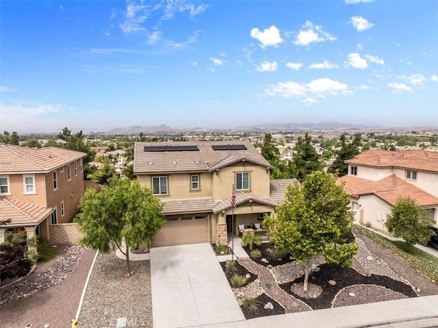 35403 Laurel Tree Ct, Winchester, CA 92596 - traditional-style home featuring a residential view, stucco siding, driveway, roof mounted solar panels, and an attached garage