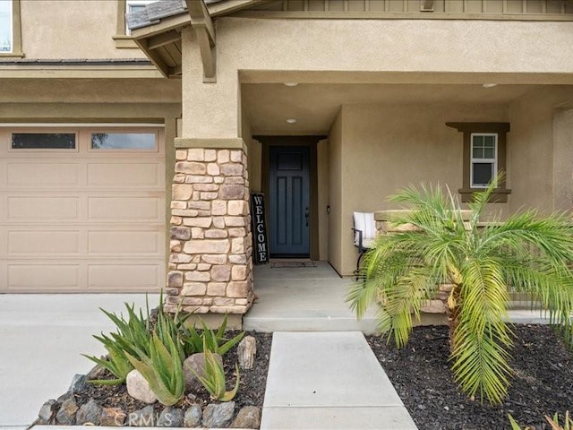 35403 Laurel Tree Ct, Winchester, CA 92596 - view of exterior entry with stucco siding and stone siding