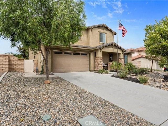 35403 Laurel Tree Ct, Winchester, CA 92596 - view of front of house with stucco siding, driveway, an attached garage, a gate, and stone siding
