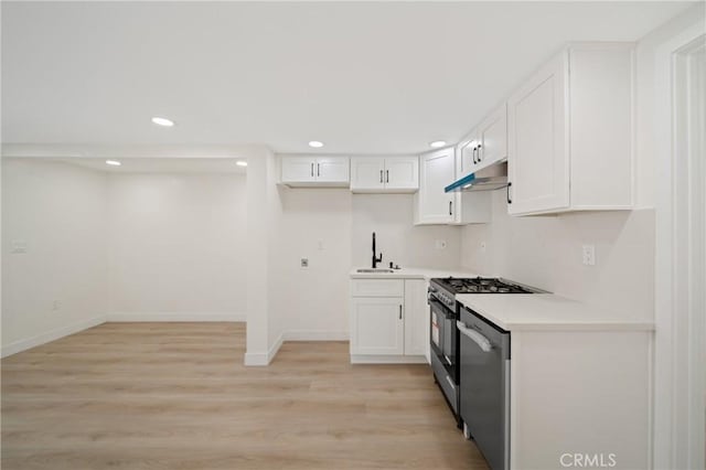 4365 Oneill St, Los Angeles, CA 90032 - kitchen with under cabinet range hood, recessed lighting, stainless steel dishwasher, white cabinets, and light wood-type flooring