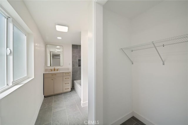 4365 Oneill St, Los Angeles, CA 90032 - spacious closet with light tile patterned flooring and a sink