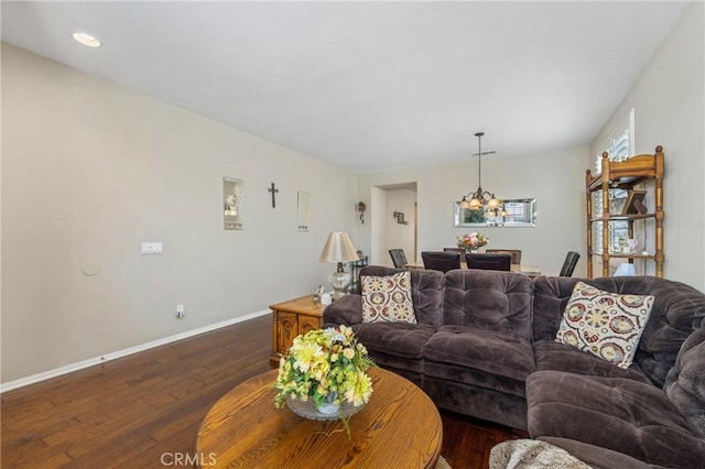 16767 Desert Lily St, Victorville, CA 92394 - living area with a chandelier, dark wood-style floors, and recessed lighting