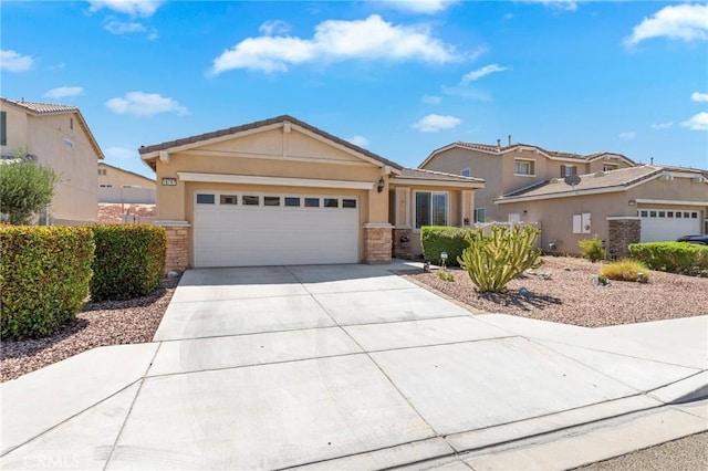 16767 Desert Lily St, Victorville, CA 92394 - single story home featuring concrete driveway, a garage, and stucco siding
