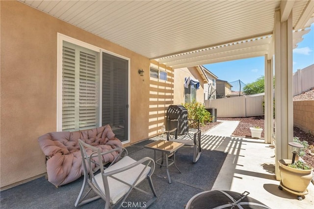 16767 Desert Lily St, Victorville, CA 92394 - fenced backyard with a patio and area for grilling