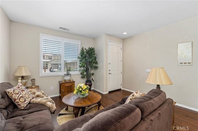 16767 Desert Lily St, Victorville, CA 92394 - living room featuring dark wood-style floors and recessed lighting