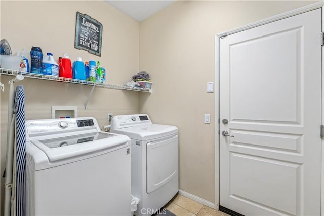 16767 Desert Lily St, Victorville, CA 92394 - laundry area featuring independent washer and dryer and light tile patterned flooring