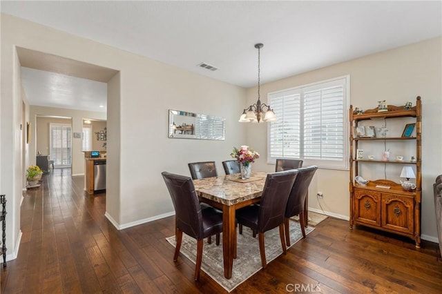16767 Desert Lily St, Victorville, CA 92394 - dining area with dark wood-style floors and a chandelier