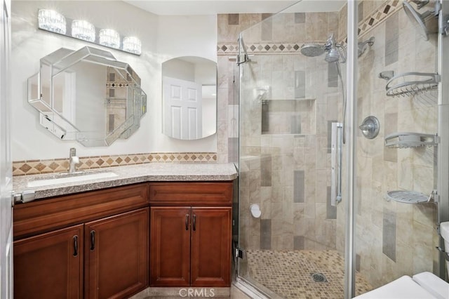 301 W Loraine St Unit 3, Glendale, CA 91202 - full bath featuring vanity, a shower stall, and backsplash