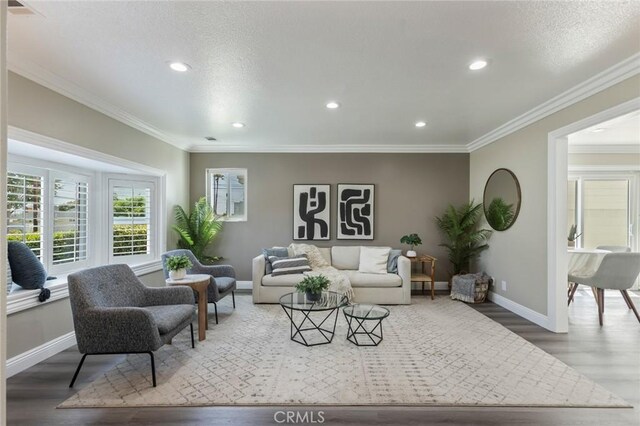 2306 255th St, Lomita, CA 90717 - living room with wood finished floors, recessed lighting, and crown molding