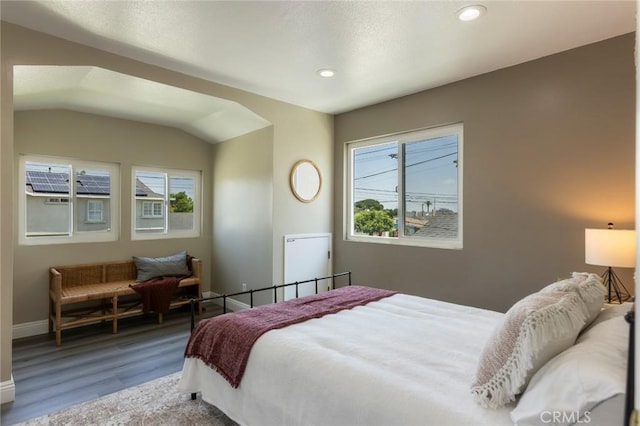 2306 255th St, Lomita, CA 90717 - bedroom featuring multiple windows, wood finished floors, recessed lighting, and vaulted ceiling