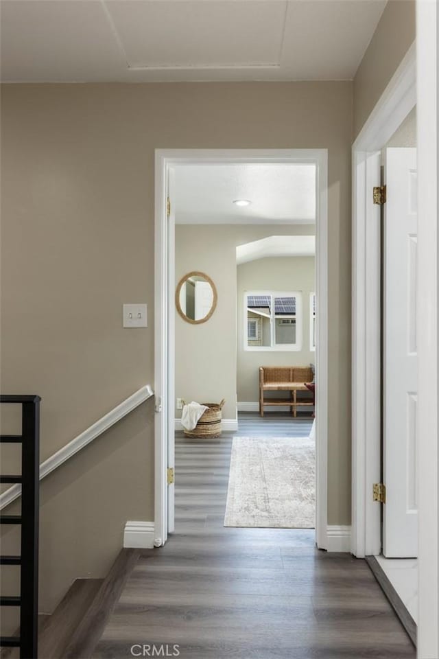 2306 255th St, Lomita, CA 90717 - corridor with wood finished floors and an upstairs landing