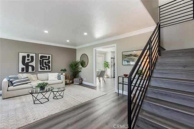 2306 255th St, Lomita, CA 90717 - living room with wood finished floors, recessed lighting, crown molding, and stairs