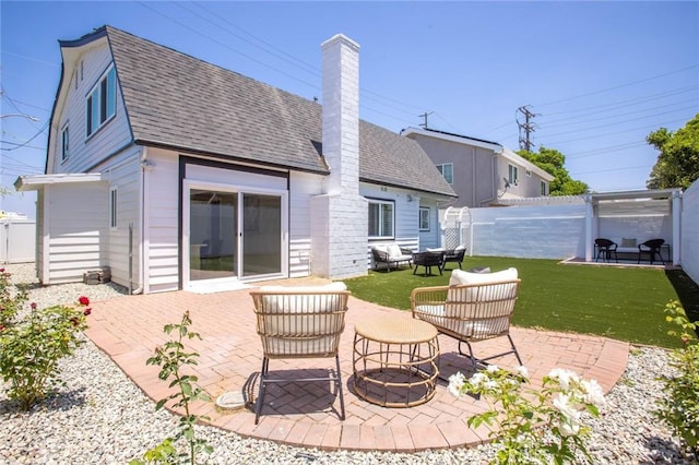 2306 255th St, Lomita, CA 90717 - fenced backyard with a patio area and an outdoor fire pit