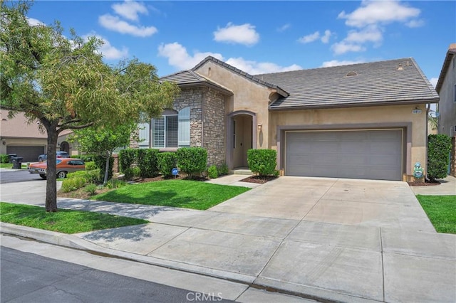 10850 Cameron Ct, Corona, CA 92883 - view of front of property with stone siding, stucco siding, driveway, a garage, and a tiled roof