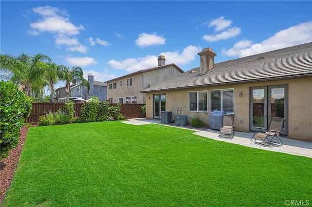 10850 Cameron Ct, Corona, CA 92883 - back of property with a patio, a tiled roof, stucco siding, and a chimney