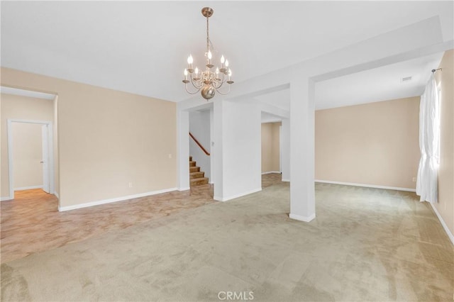 10850 Cameron Ct, Corona, CA 92883 - empty room with light colored carpet, stairway, and a chandelier