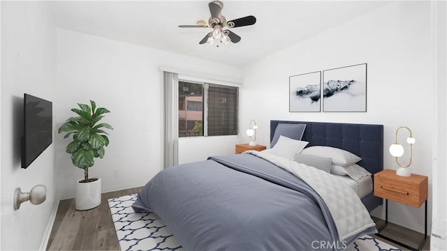 4431 Don Ricardo Dr Unit 20, Los Angeles, CA 90008 - bedroom featuring wood finished floors and a ceiling fan
