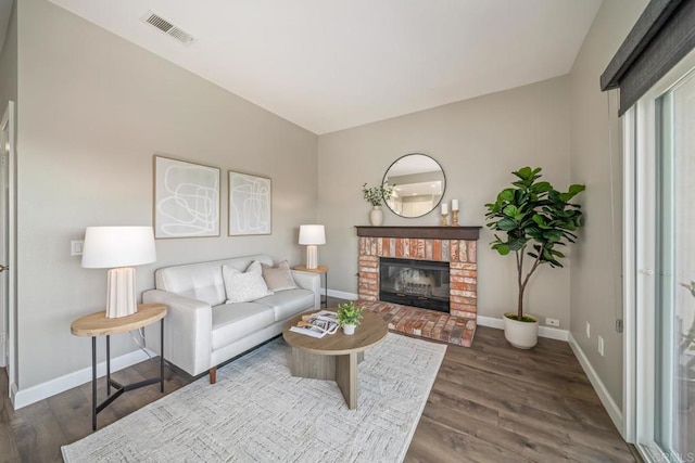4507 Carnaby Ct, Carlsbad, CA 92010 - living area with wood finished floors and a fireplace