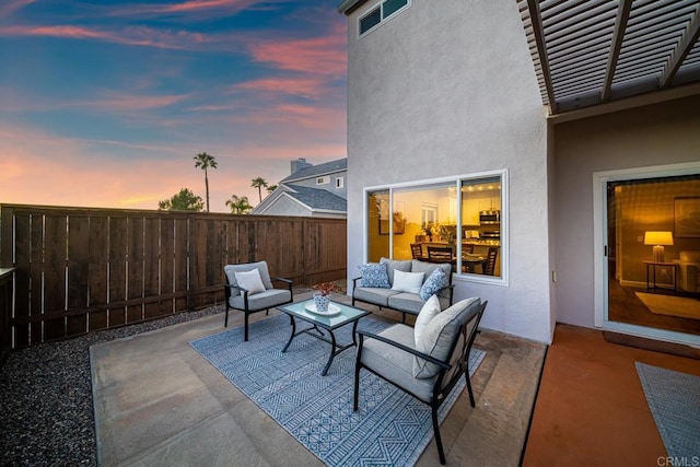 4507 Carnaby Ct, Carlsbad, CA 92010 - patio terrace at dusk with outdoor lounge area and a patio area