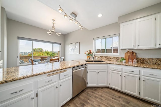 4507 Carnaby Ct, Carlsbad, CA 92010 - kitchen featuring dishwasher, healthy amount of natural light, a chandelier, white cabinets, and recessed lighting