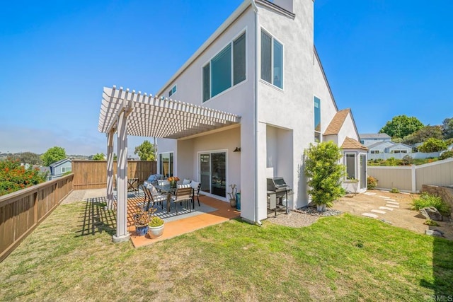 4507 Carnaby Ct, Carlsbad, CA 92010 - back of house featuring stucco siding, a pergola, a fenced backyard, and a patio