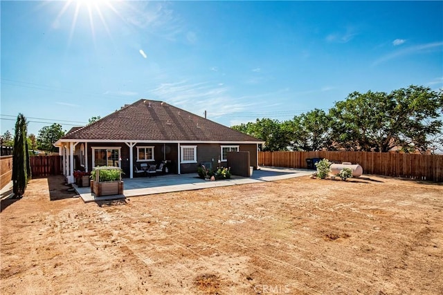 33430 133rd St E, Pearblossom, CA 93553 - back of property with a fenced backyard and a patio